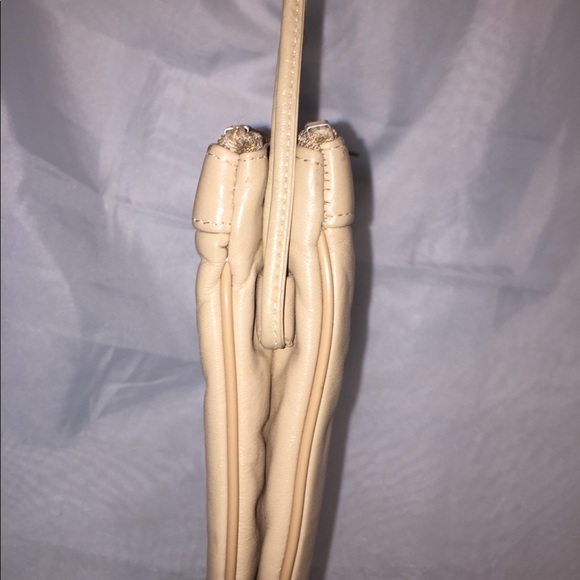 Etienne Aigner’s faux leather crossbody in beige - Picture 4 of 8